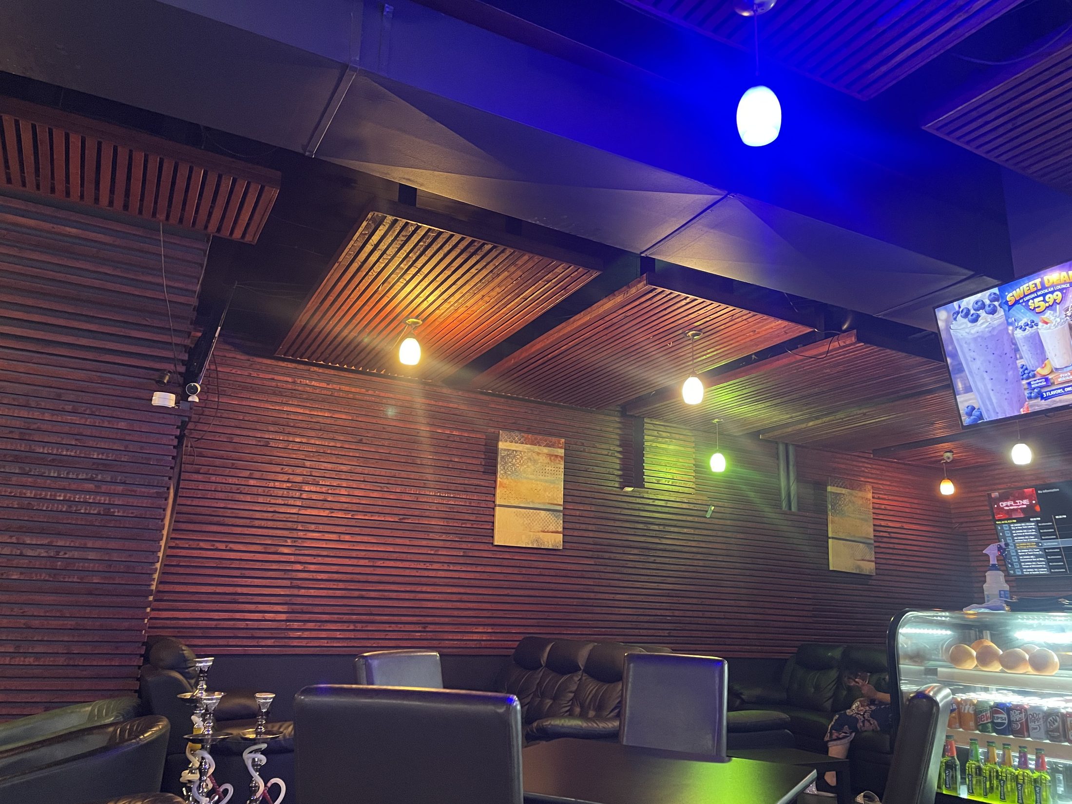 Hookahs and seating inside Shi Chai Hookah Lounge